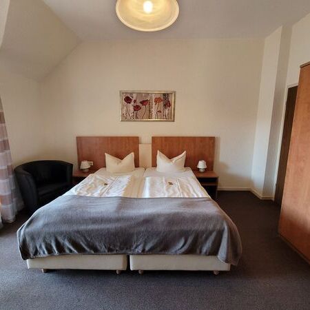 Doppelzimmer mit Balkon in der Villa Germania