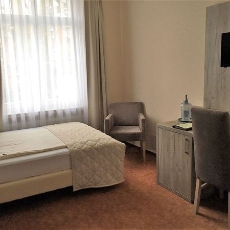 Einzelzimmer im Rosengarten