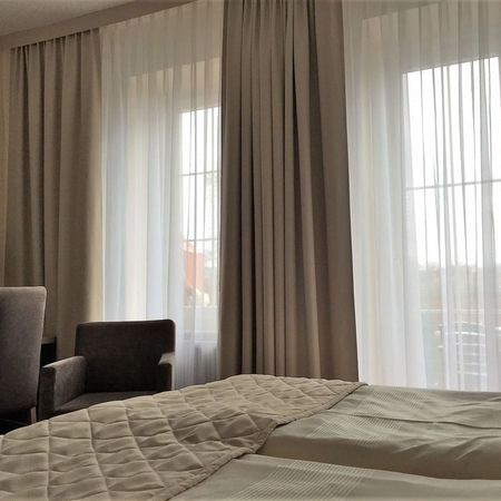 Doppelzimmer mit Balkon im Rosengarten