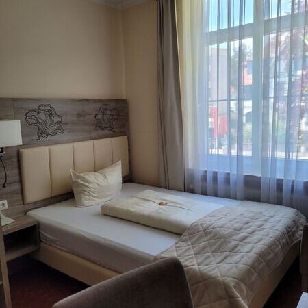 Einzelzimmer im Rosengarten